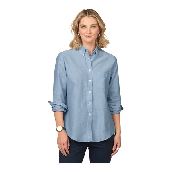 A women's light blue long sleeve button-up oxford dress shirt.