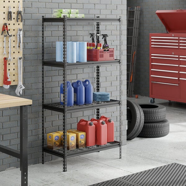 A black metal four-shelf boltless wire shelving unit with various automotive and cleaning supplies stored on it.