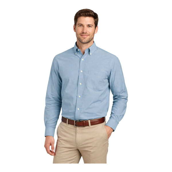A men's light blue long sleeve oxford dress shirt with a button-down collar and front pocket.