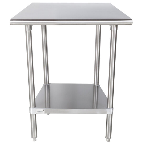 An Advance Tabco stainless steel work table with a shelf.