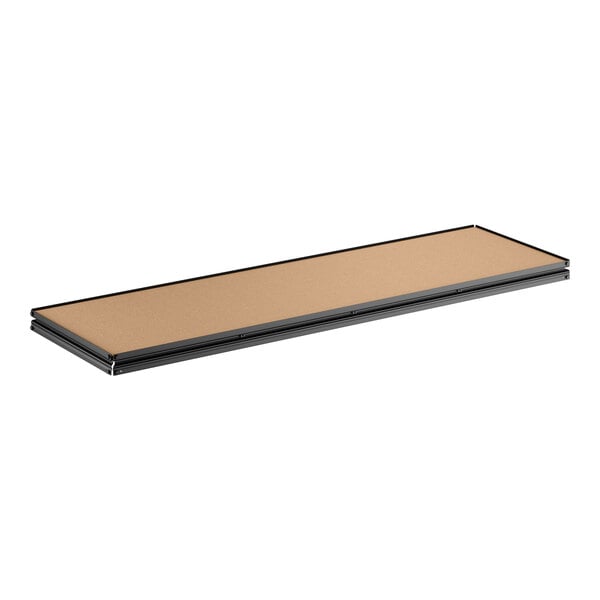 A rectangular black Z-beam particleboard shelf designed for boltless shelving units.