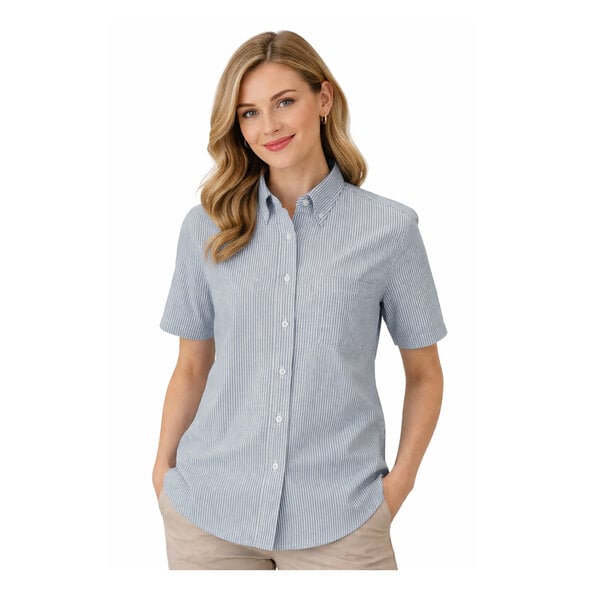 A women's short sleeve blue striped oxford dress shirt with buttons and a collar.