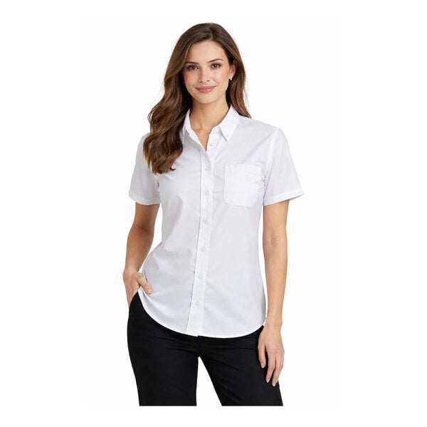 A women's white short sleeve button-up oxford dress shirt with a front pocket.