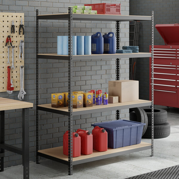 A black heavy-duty four-shelf boltless particle board shelving unit with various items stored on each shelf.