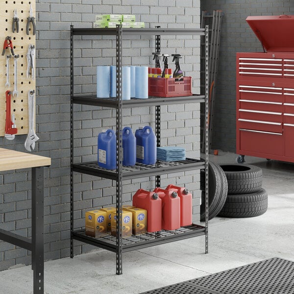 A black metal 4-shelf boltless wire shelving unit with various automotive and cleaning supplies stored on it.