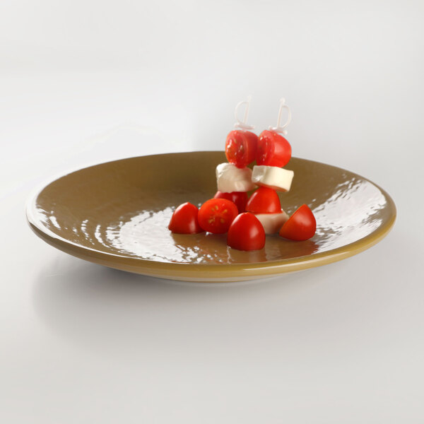 An Elite Global Solutions Pebble Creek Tapenade-colored melamine plate with tomatoes and mozzarella on it.