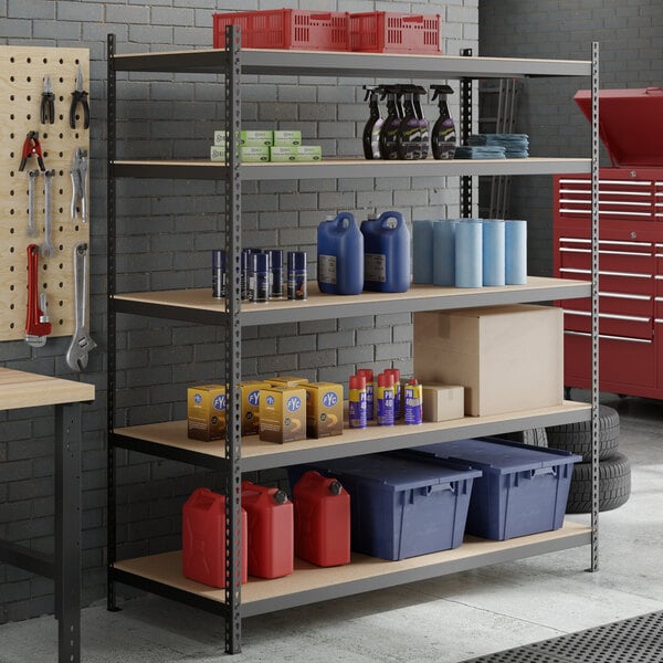 A black heavy-duty five-shelf boltless particle board shelving unit with various storage items placed on the shelves.