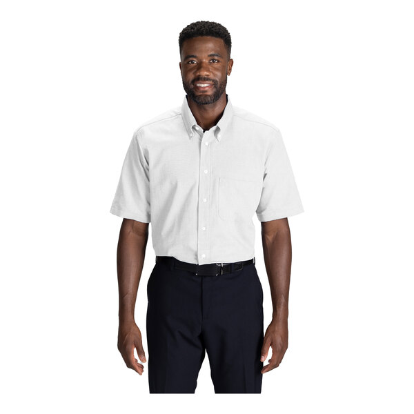 A men's white short sleeve oxford dress shirt with a front pocket and button-down collar.