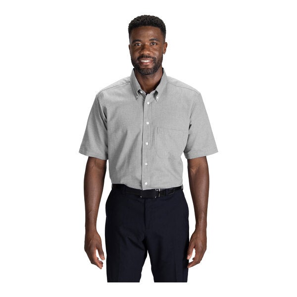 A men's light gray short sleeve button-up dress shirt with a front pocket.