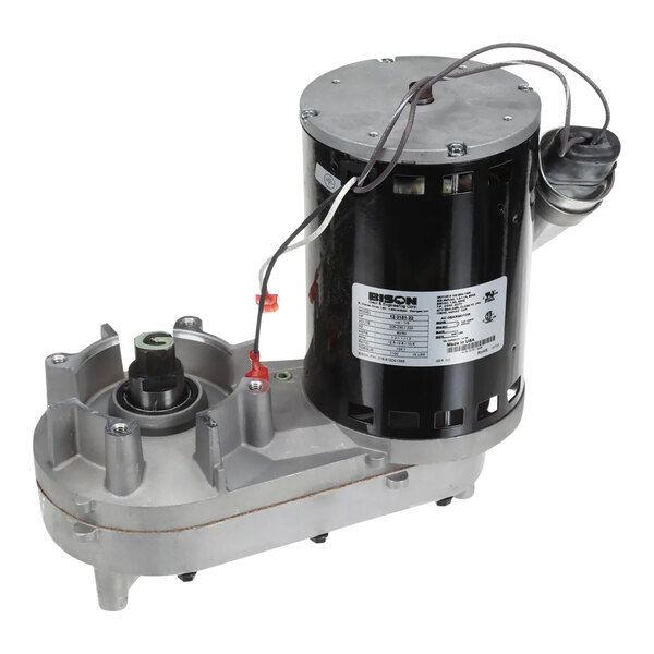 A Scotsman service gearbox with a small motor and a wire attached.