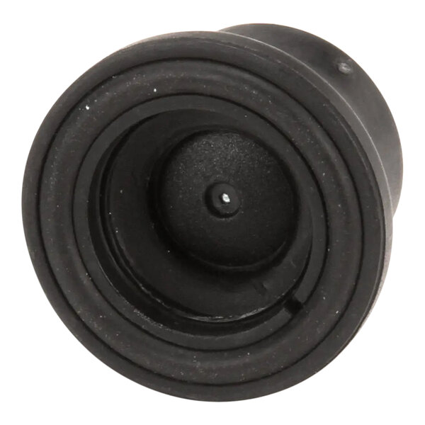 A black plastic TurboChef leg with a white dot on it.