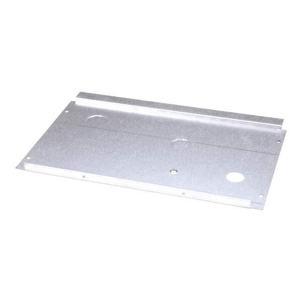 A silver metal shroud with holes.