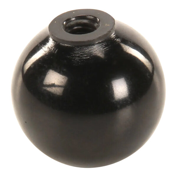 A black circular Southbend knob with a metal nut on it.