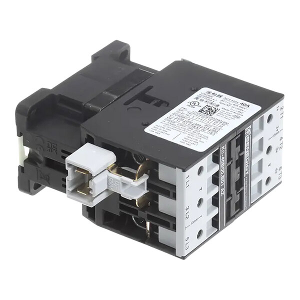 A close-up of a black and white Rational contactor with two terminals and two wires.