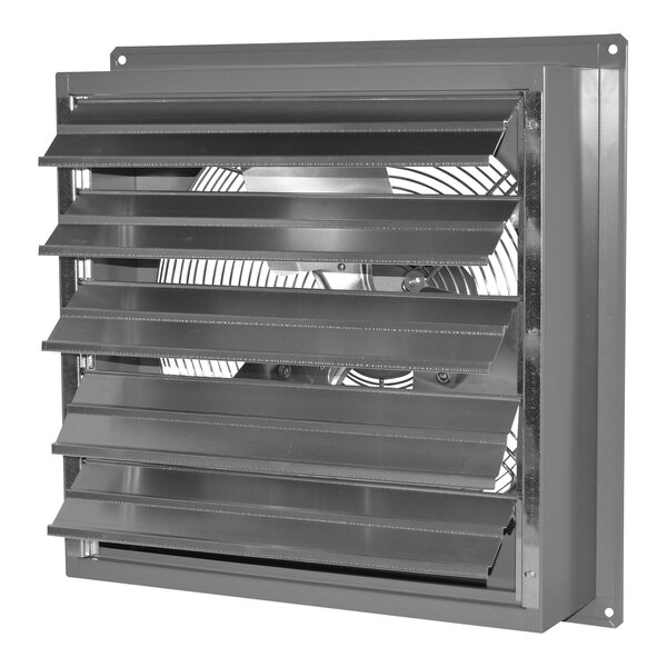 A grey metal Canarm wall exhaust fan with four blades.