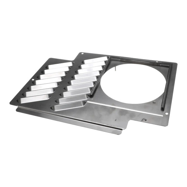 A TurboChef metal back panel with four holes.