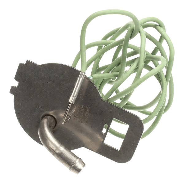 A metal Rational inspection lid with a green cable attached.