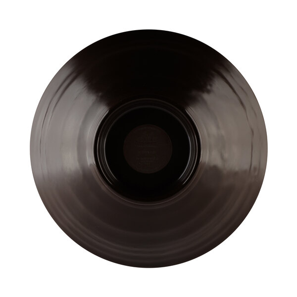 A black bowl with a circular pattern on it.