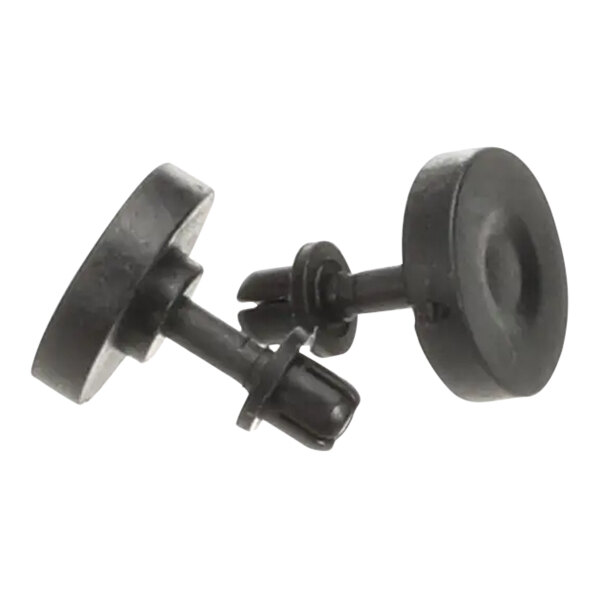 A black plastic spreader rivet with round metal studs.