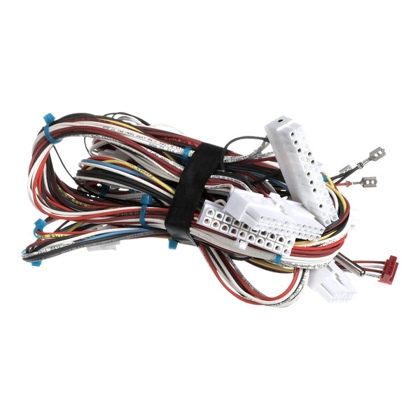 A close-up of a TurboChef I3 wiring harness with multicolored wires.