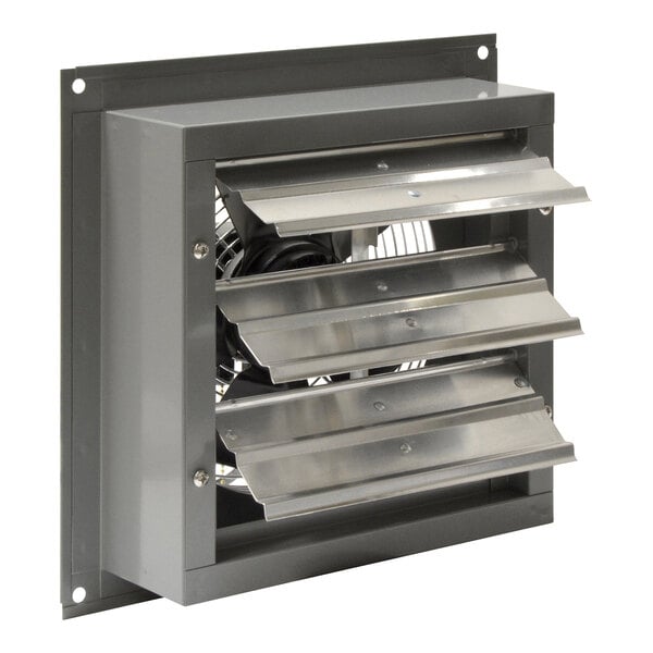 A metal wall exhaust fan with a fan in a metal vent.