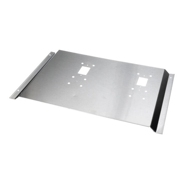 A Scotsman metal splash panel with holes on a table.