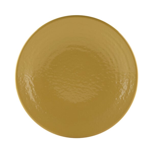 A yellow plate with a textured surface.