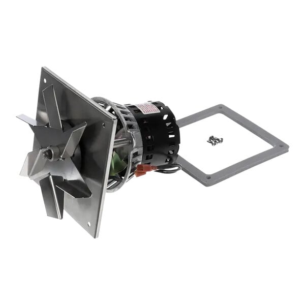 A Wells motor and fan assembly with a metal frame.