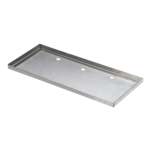 A metal Wells G7-Z12047 front panel with holes.