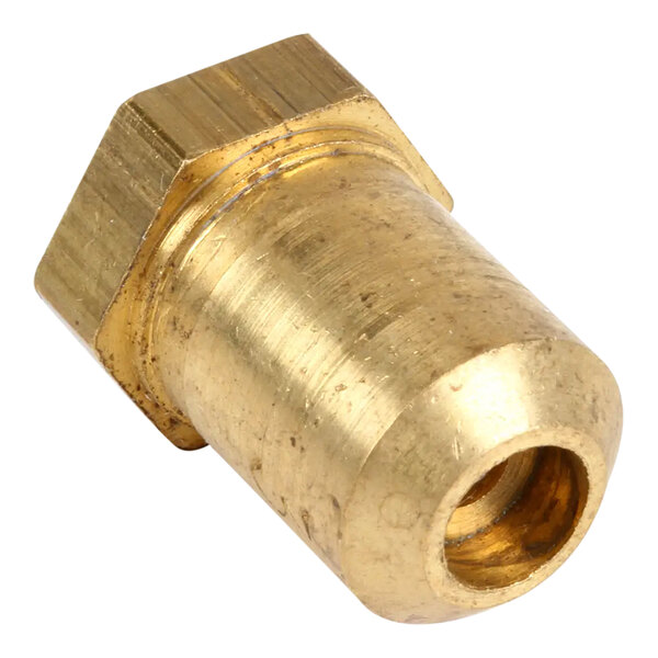 A gold brass orifice fitting with a hole.