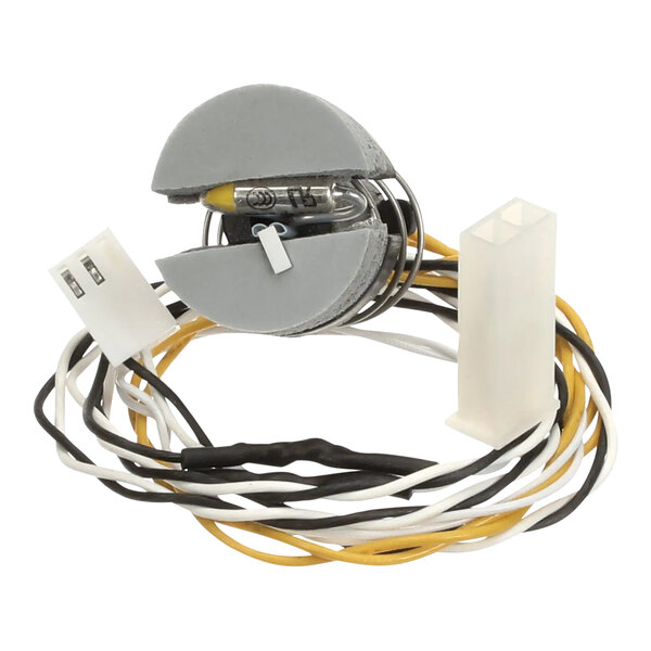 The white and yellow wires with a black and white connector on a TurboChef assembly.