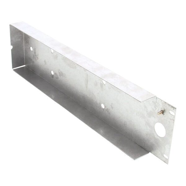 A metal cover with holes for a Wells product.