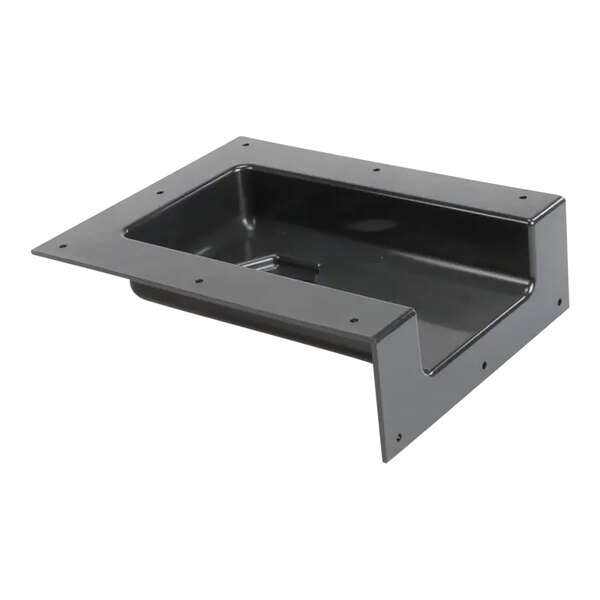 A black metal Scotsman drain adaptor with a hole in it.