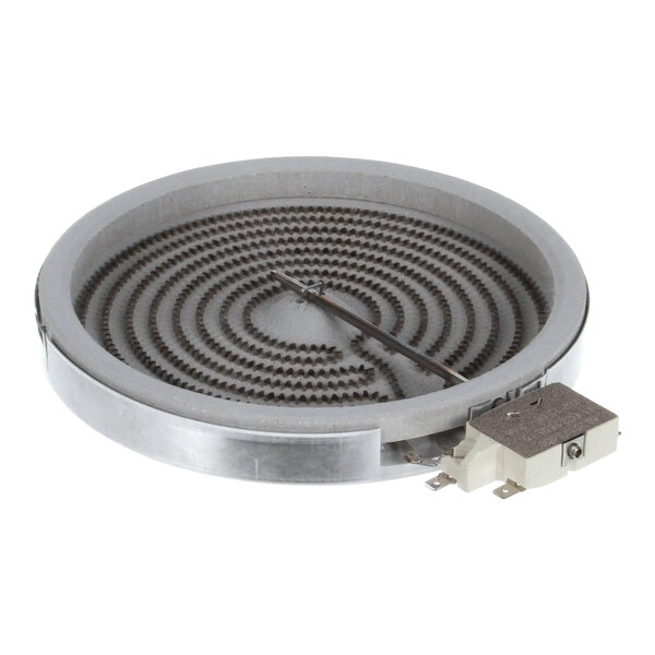 A circular metal electric stove burner with a spiral pattern.