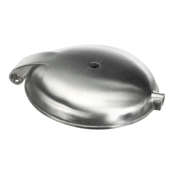 A close-up of a stainless steel Wells top/bottom casting with a hole.