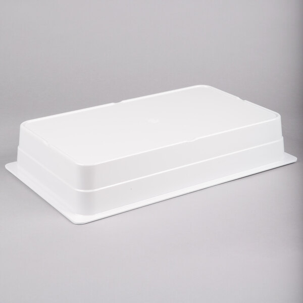 A white rectangular melamine food pan.