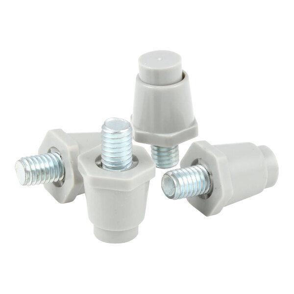 A close-up of three grey plastic screws with screws.