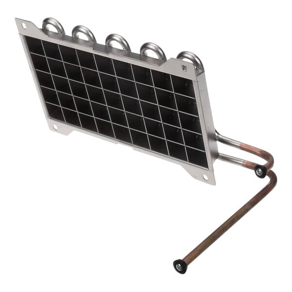 A metal plate with black squares attached to a metal pipe.