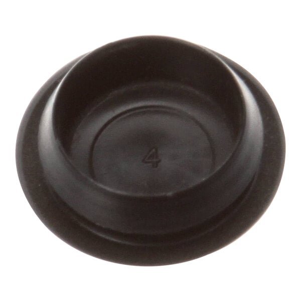 A black round plastic plug with a 5/8 inch hole and a number 101195 on it.