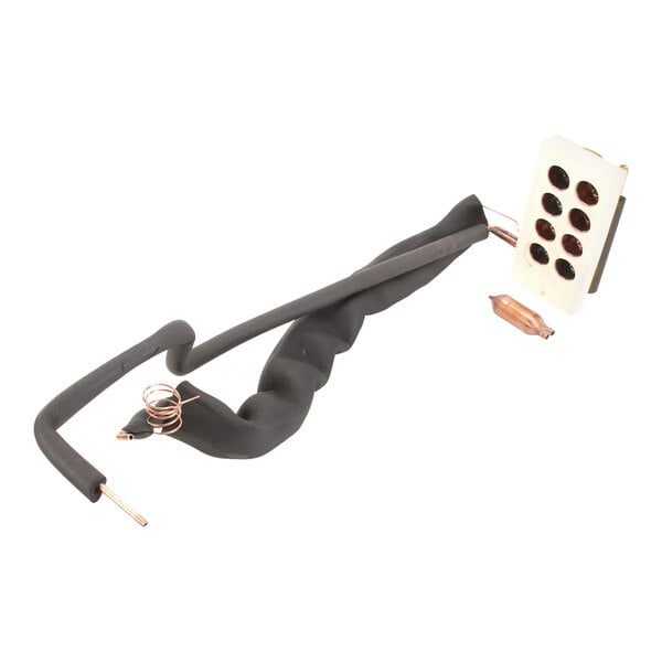 A black and white wire with a black and white plug connecting to the Scotsman A36699-020 evaporator.