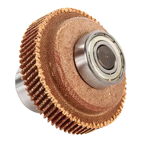 A close-up of a copper and brass Scotsman gear with a metal ring.