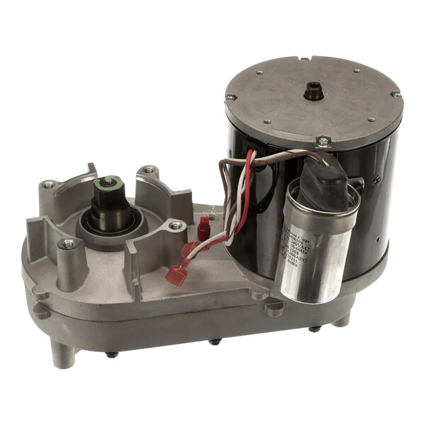 A close-up of a Scotsman 115V gearbox assembly with a small motor.