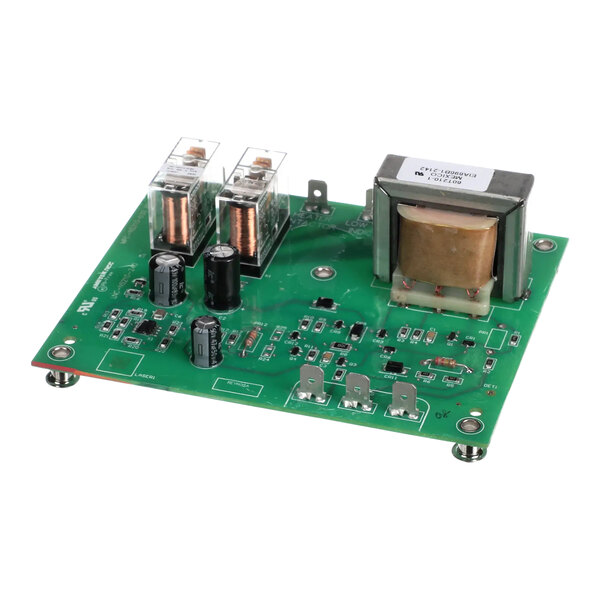 A green Wells water level control circuit board with two electronic components.