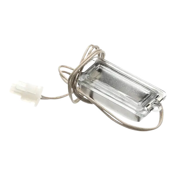 A small rectangular silver lamp assembly with a wire attached.