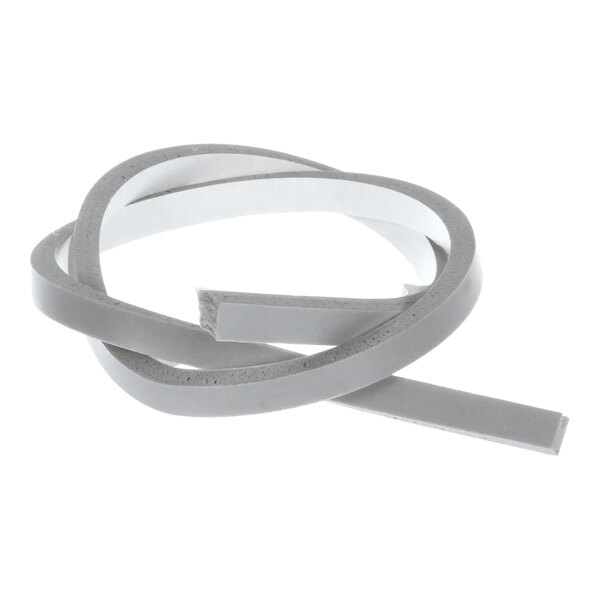 A close-up of a gray Wells silicone tape band with a white strip.