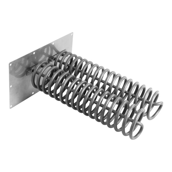 A metal spring on a metal plate.