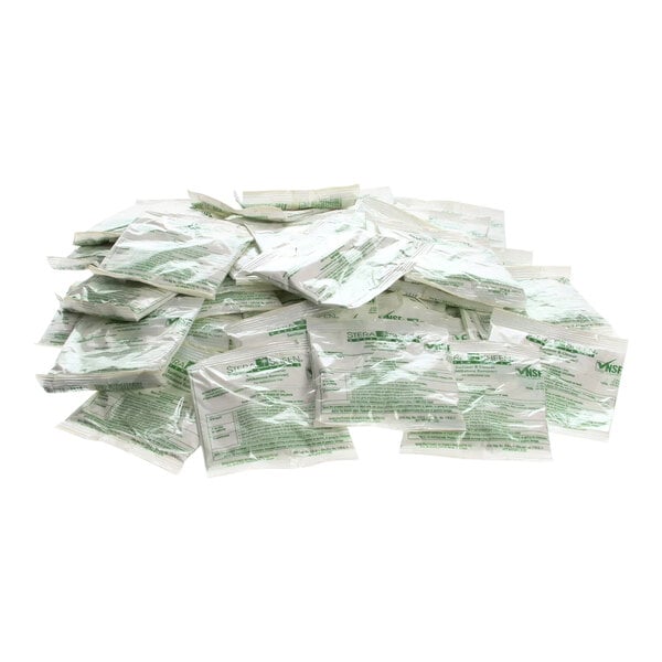 A stack of plastic bags with green and white labels.