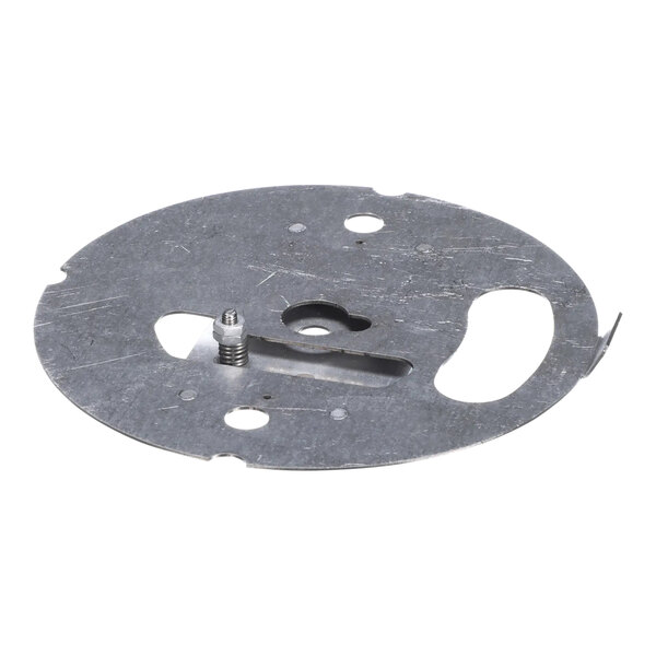 A metal circular lower mounting plate with a hole in it.