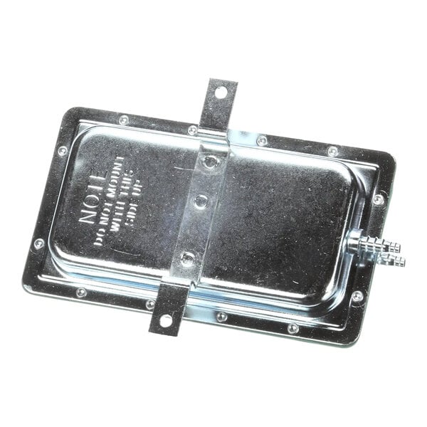 A metal plate with screws for a Wells 2E-Z14673 pressure switch.