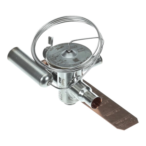 A metal Scotsman thermo expansion valve with a wire.